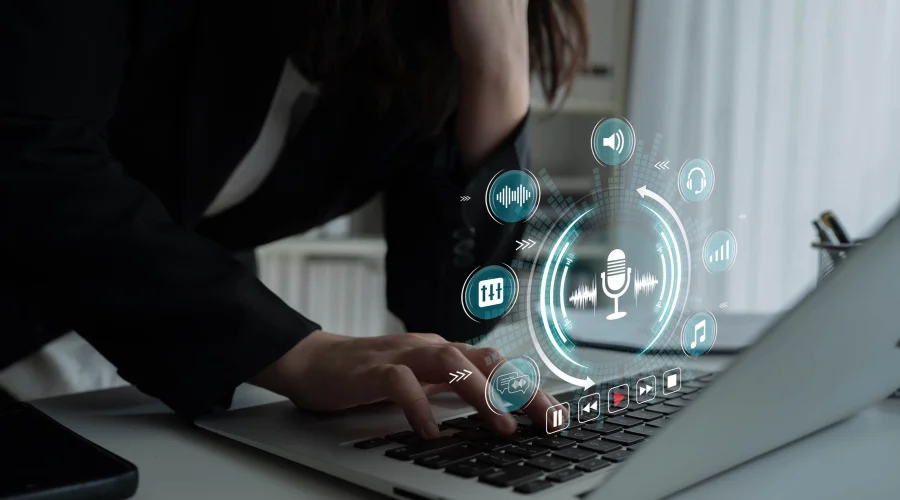 Business professional using integrated business VoIP solutions with CRM on laptop.